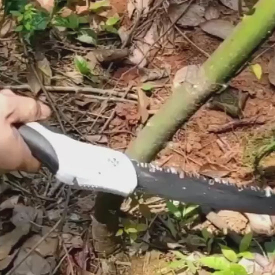 {{hiking gear}} {{Tac Treasure Shop}} {{ handsaw in use }}  {{ cutting various branches }}