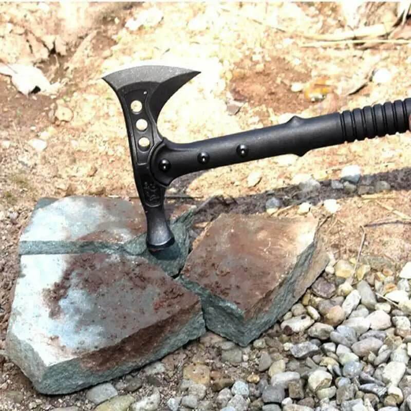 {{Camping Gear {{ Hiking Gear }} }} - {{Tac Treasure Shop }} {{ Survival Axe shown using hammer to break rock }}