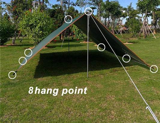 {{Camping Gear {{ Hiking Gear }} }} - {{Tac Treasure Shop }} {{ Waterproof camping Tarp.  Tarp shown set up in classic triangle fashion 1 pole and the front and 1 at the back. 8 Hanging points are highlighted. Set up in open area with scattered trees in the background.